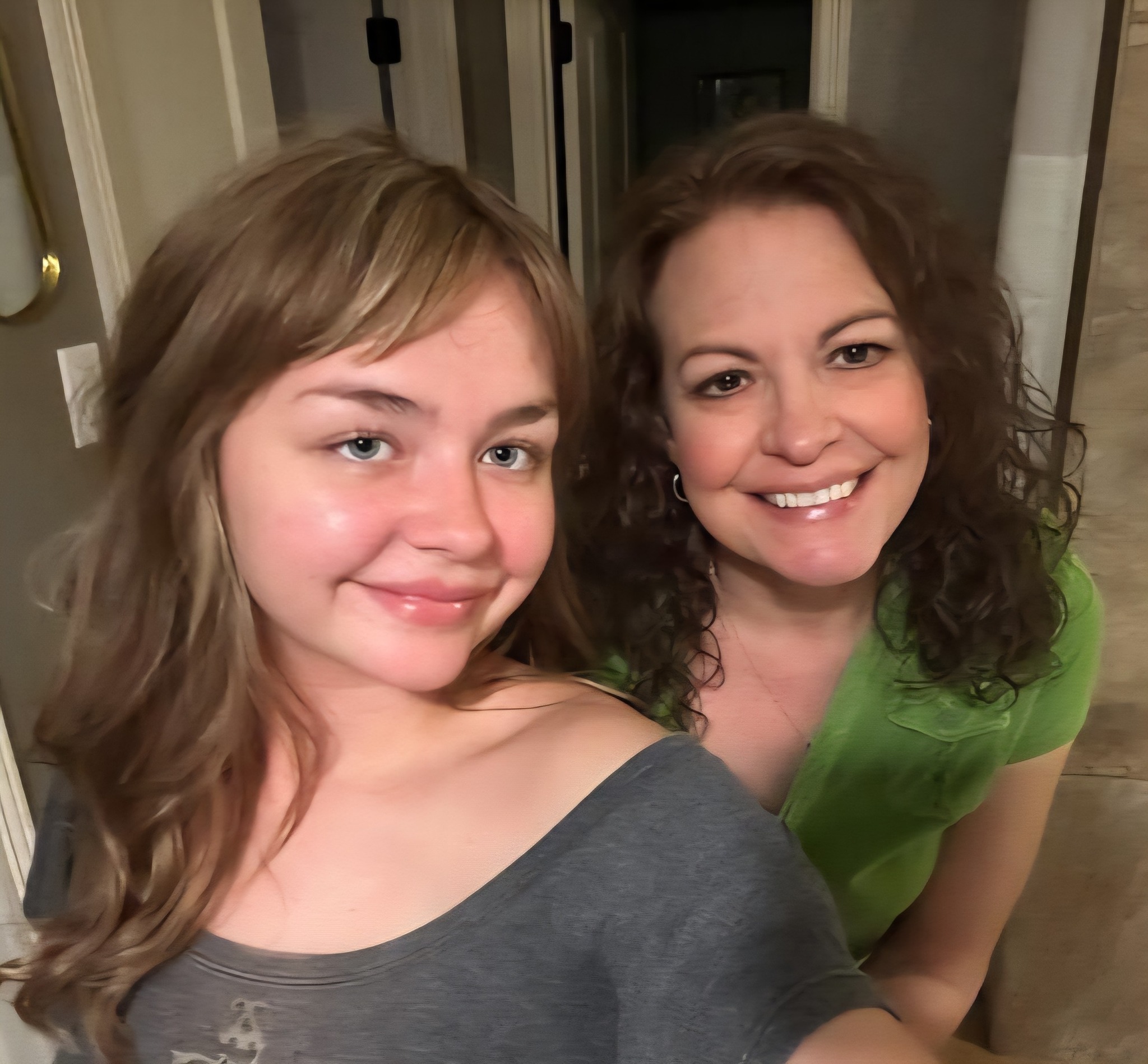 Robyn Smith smiling with her daughter outdoors in Magnolia–Conroe, Texas.