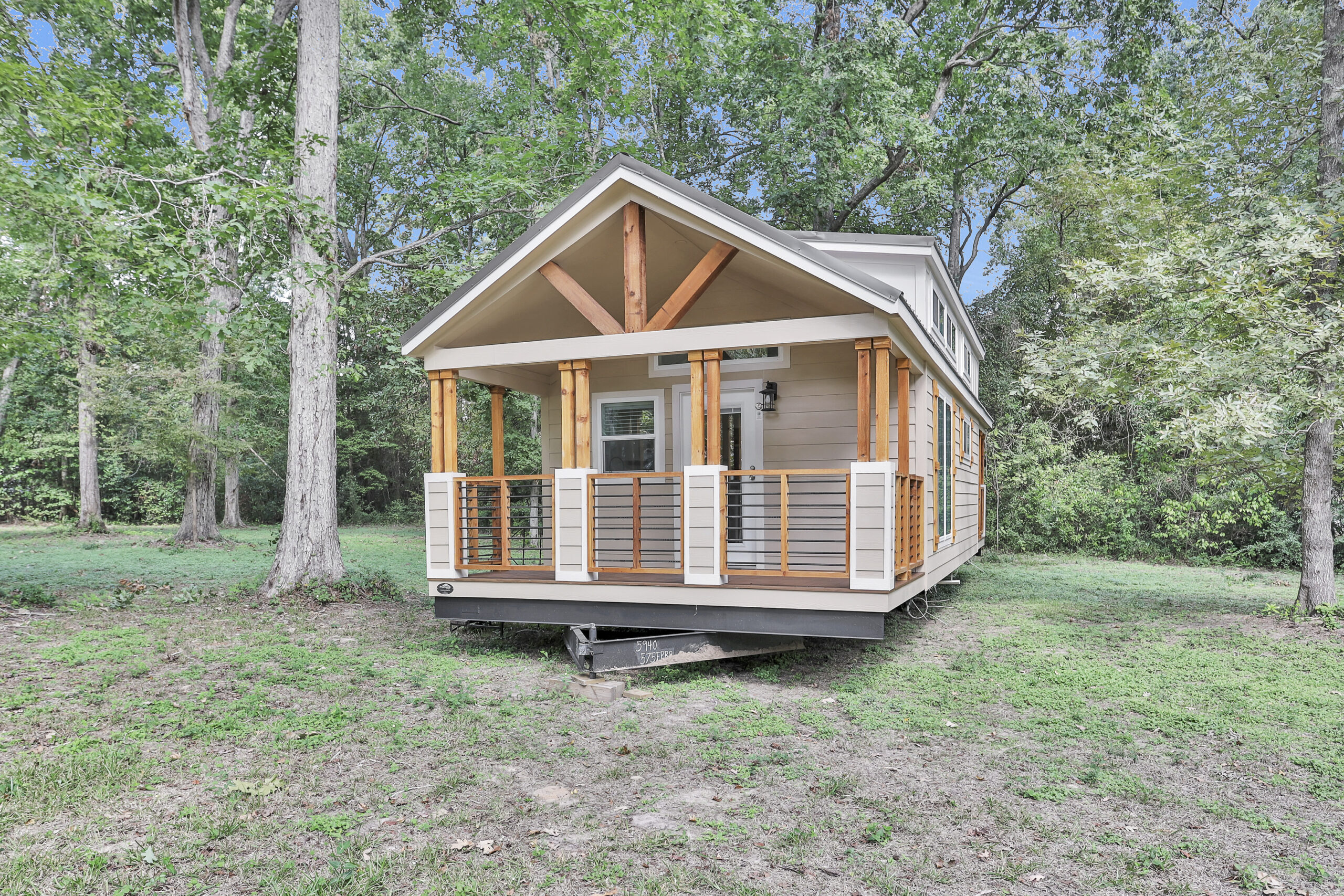 Exterior of the Cardinal tiny home with modern design and clean architectural lines