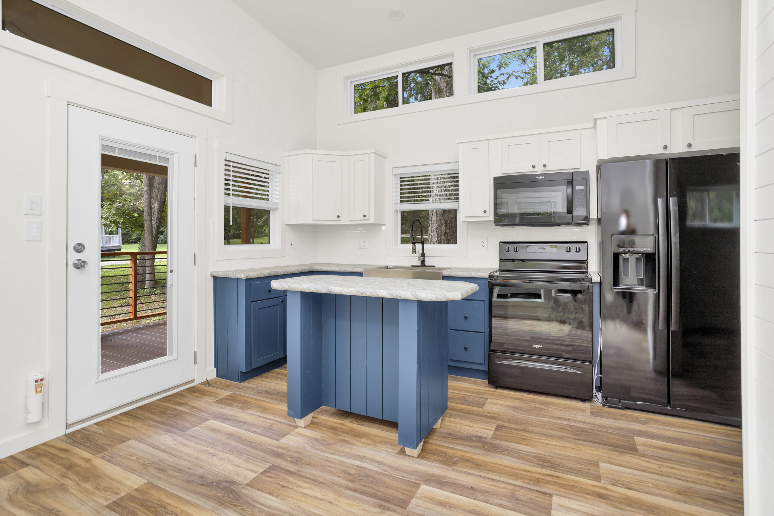 Interior view of the Cardinal tiny home showing open living space and modern finishes