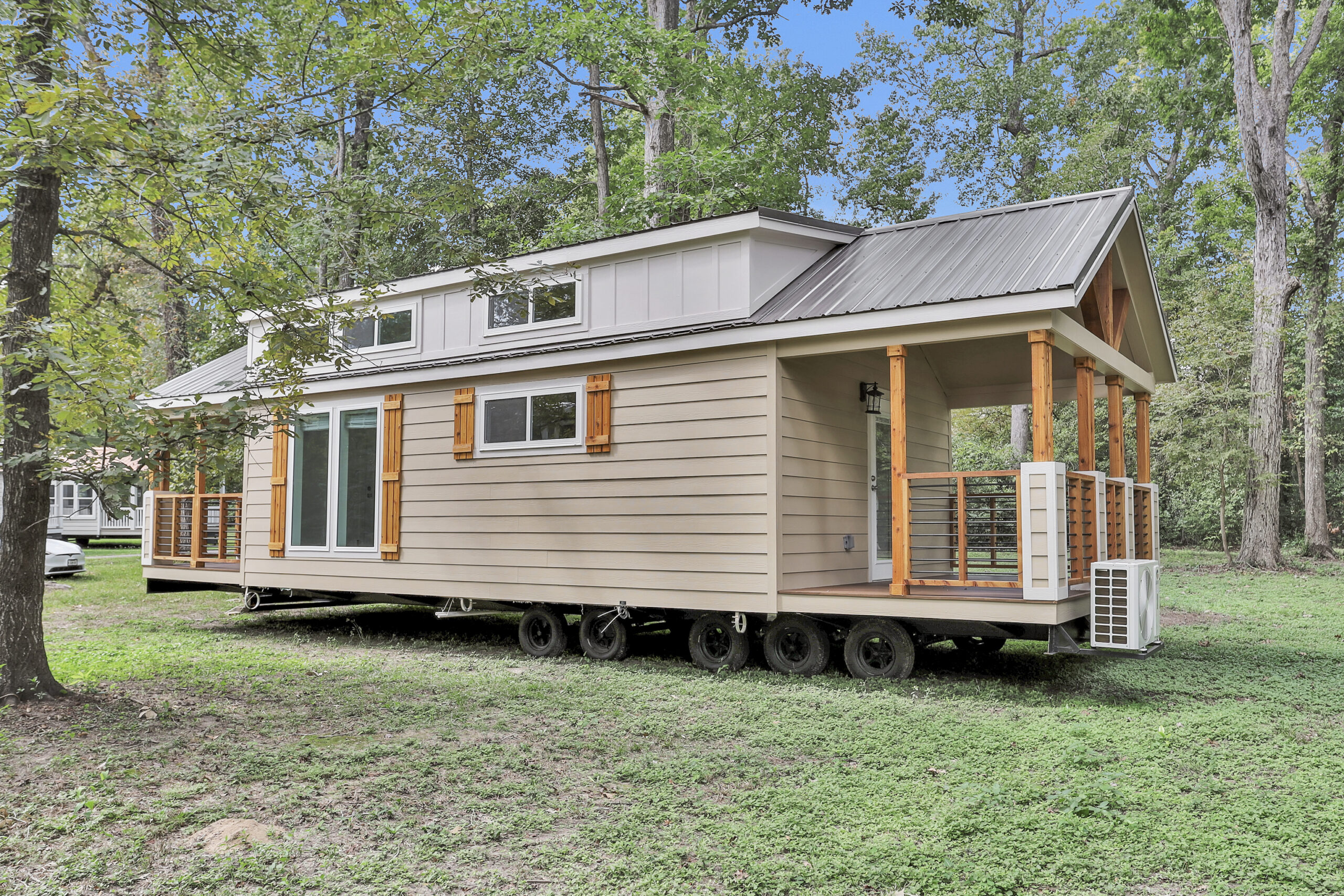 Side view of the Cardinal tiny home showing its exterior design and roofline