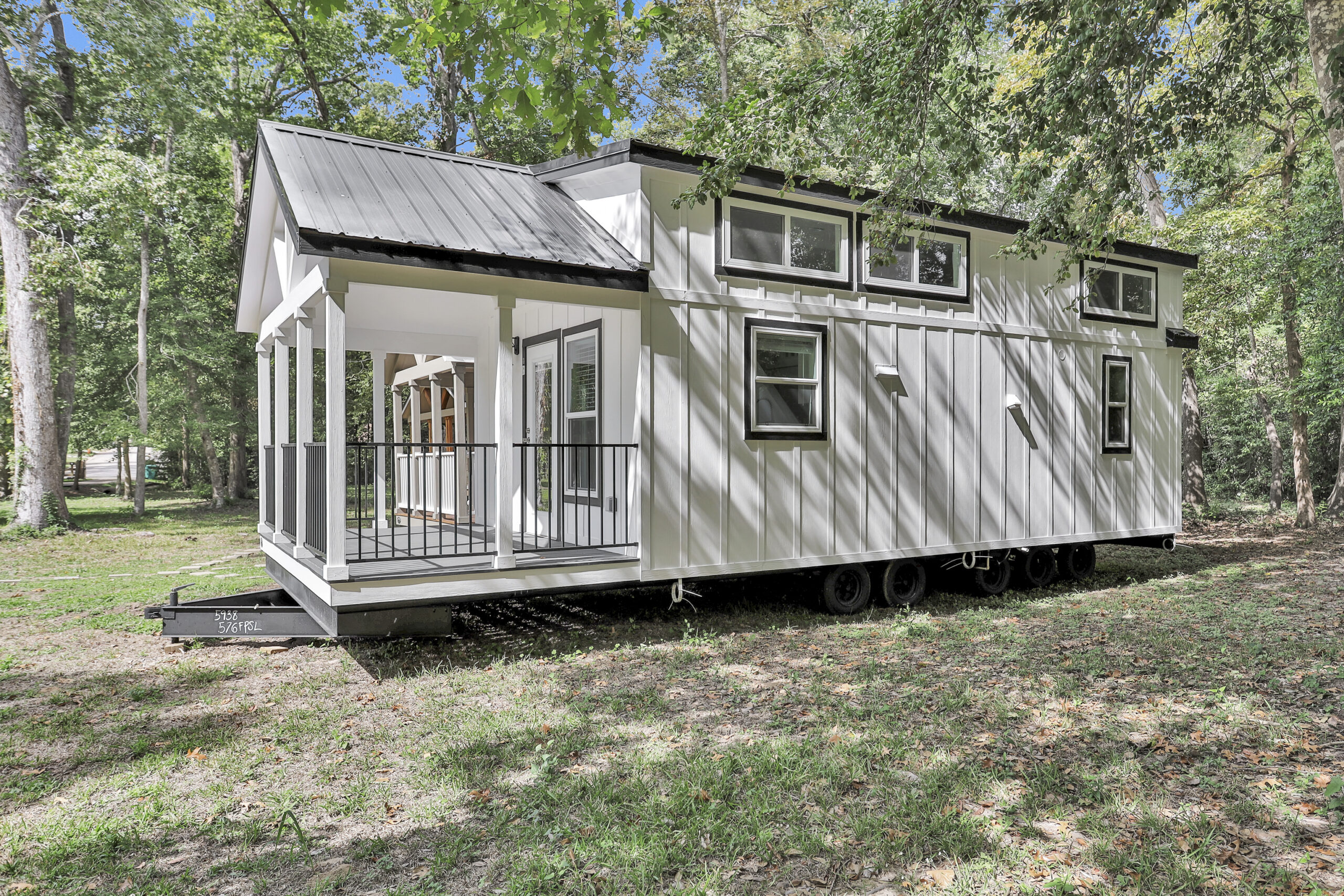 Side view of the Tumbleweed tiny home showing exterior design and roofline